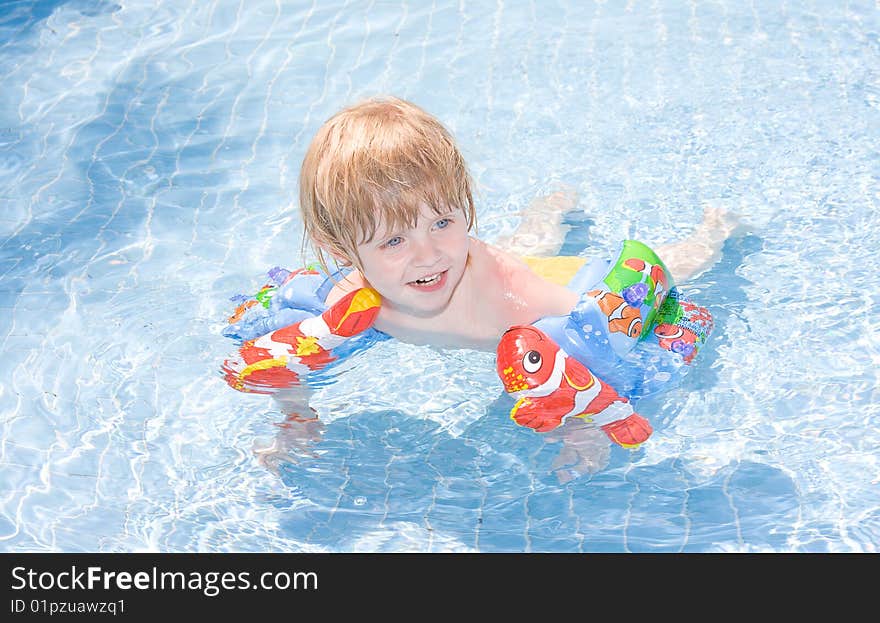 Little girl in the swimming pool. Little girl in the swimming pool