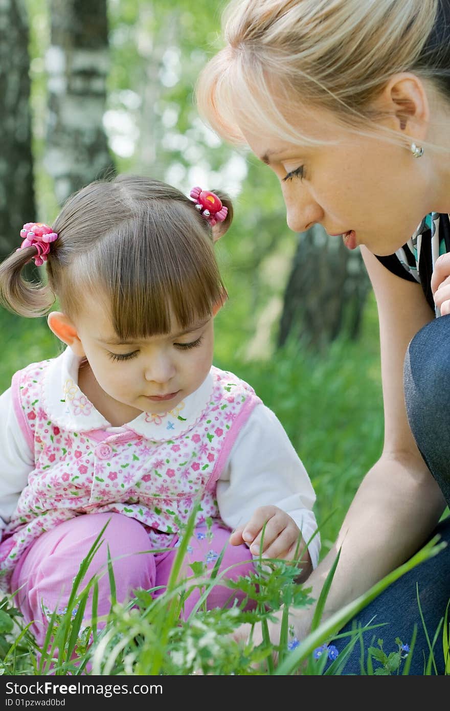 Mother and daughter outdoor in Summer park