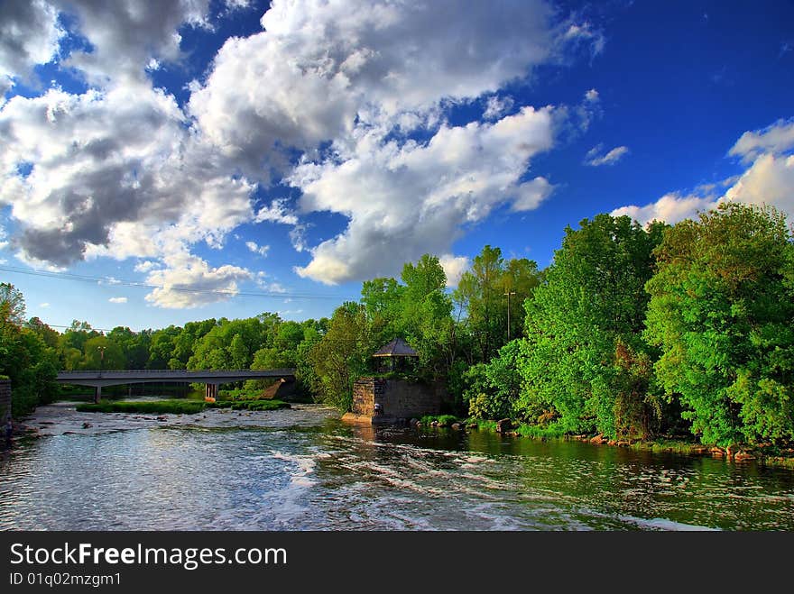 Afternoon Clouds Over The River