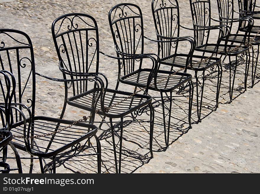 Old chairs on a row