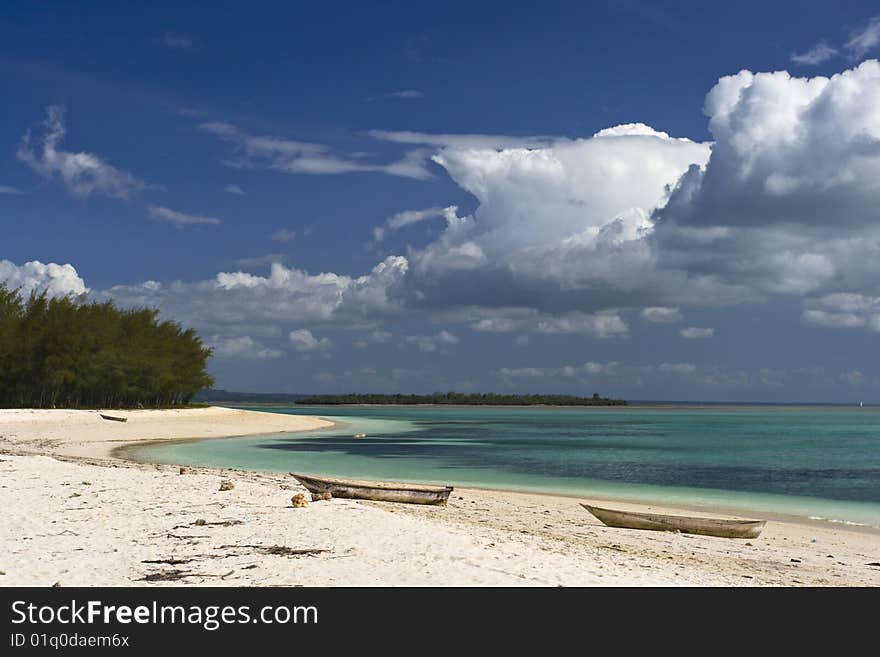 Sand beach with fishing boats and moody sky nearby Kendwa,Zanzibar. Sand beach with fishing boats and moody sky nearby Kendwa,Zanzibar