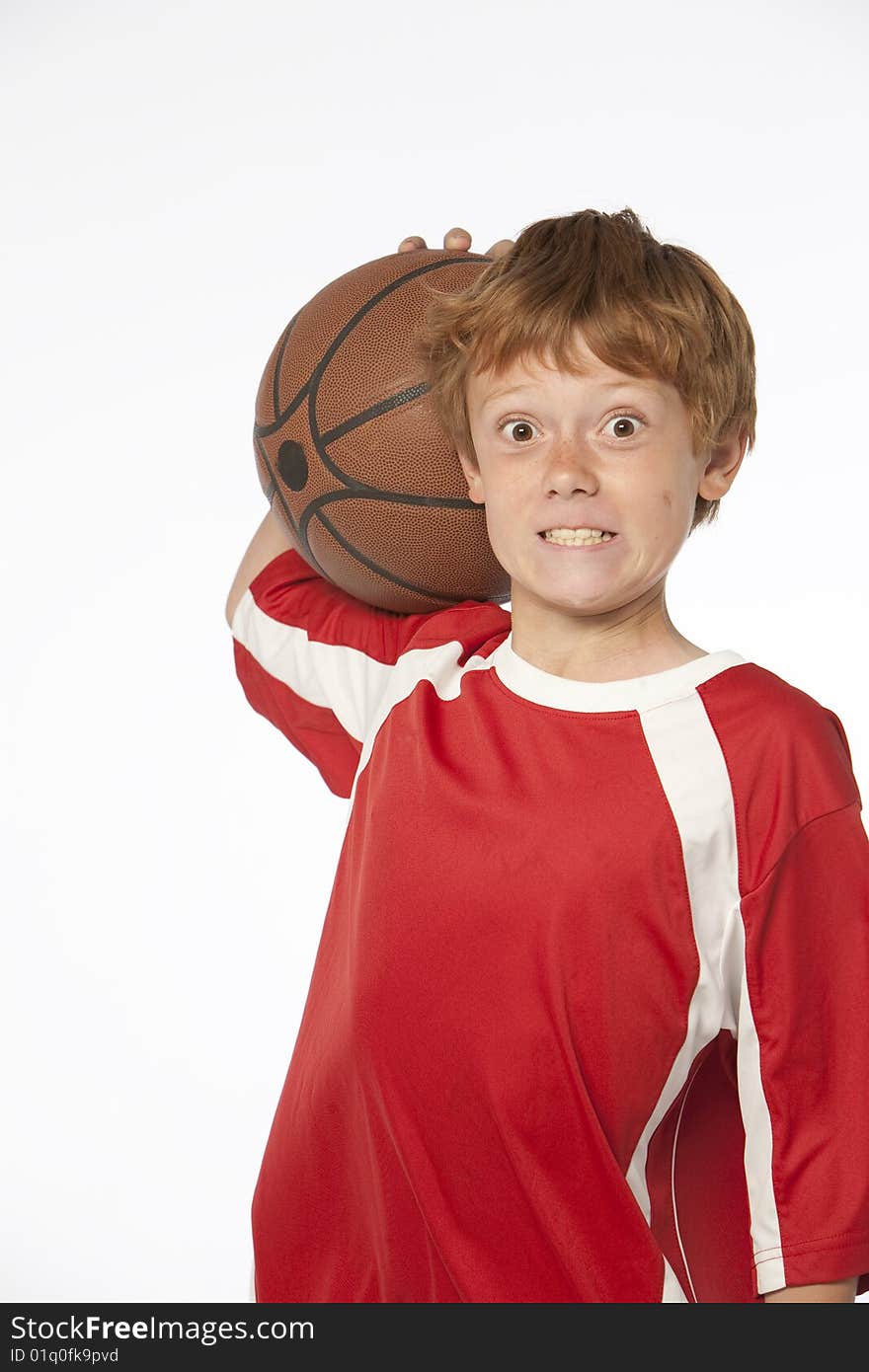 Young man on white holding basketball. Young man on white holding basketball