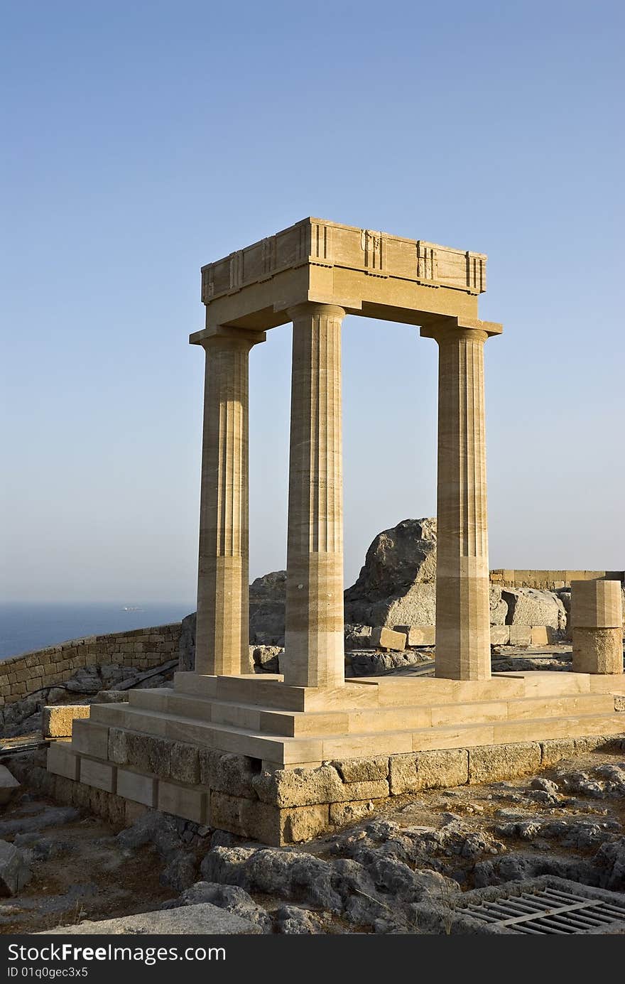 In the city of Lindos on a high rock there are ruins of an ancient acropolis. In this acropolis there was a temple of the ancient Greek goddess of Athena. Island Rhodes. Greece. In the city of Lindos on a high rock there are ruins of an ancient acropolis. In this acropolis there was a temple of the ancient Greek goddess of Athena. Island Rhodes. Greece.