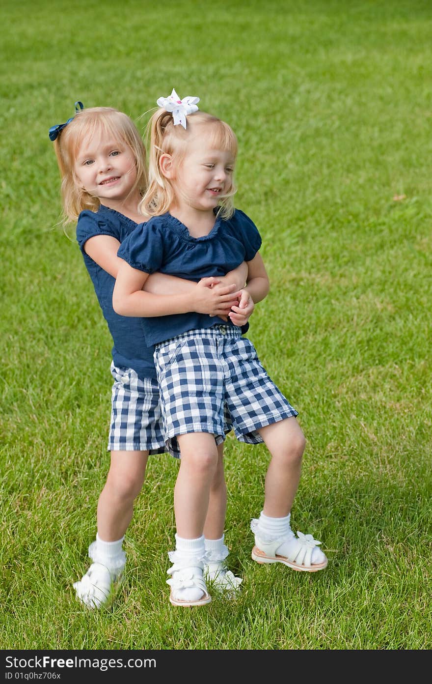 Two Little girls hugging