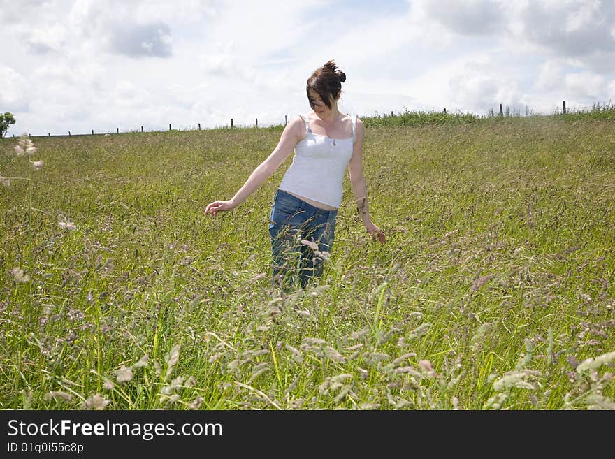 Wonman in the middle of a field