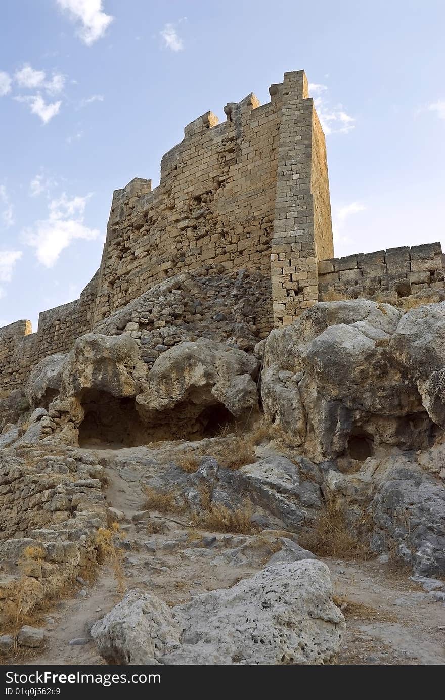 Ancient fortress constructed in an antiquity knights crusaders. Island Rhodes, Greece. Ancient fortress constructed in an antiquity knights crusaders. Island Rhodes, Greece.