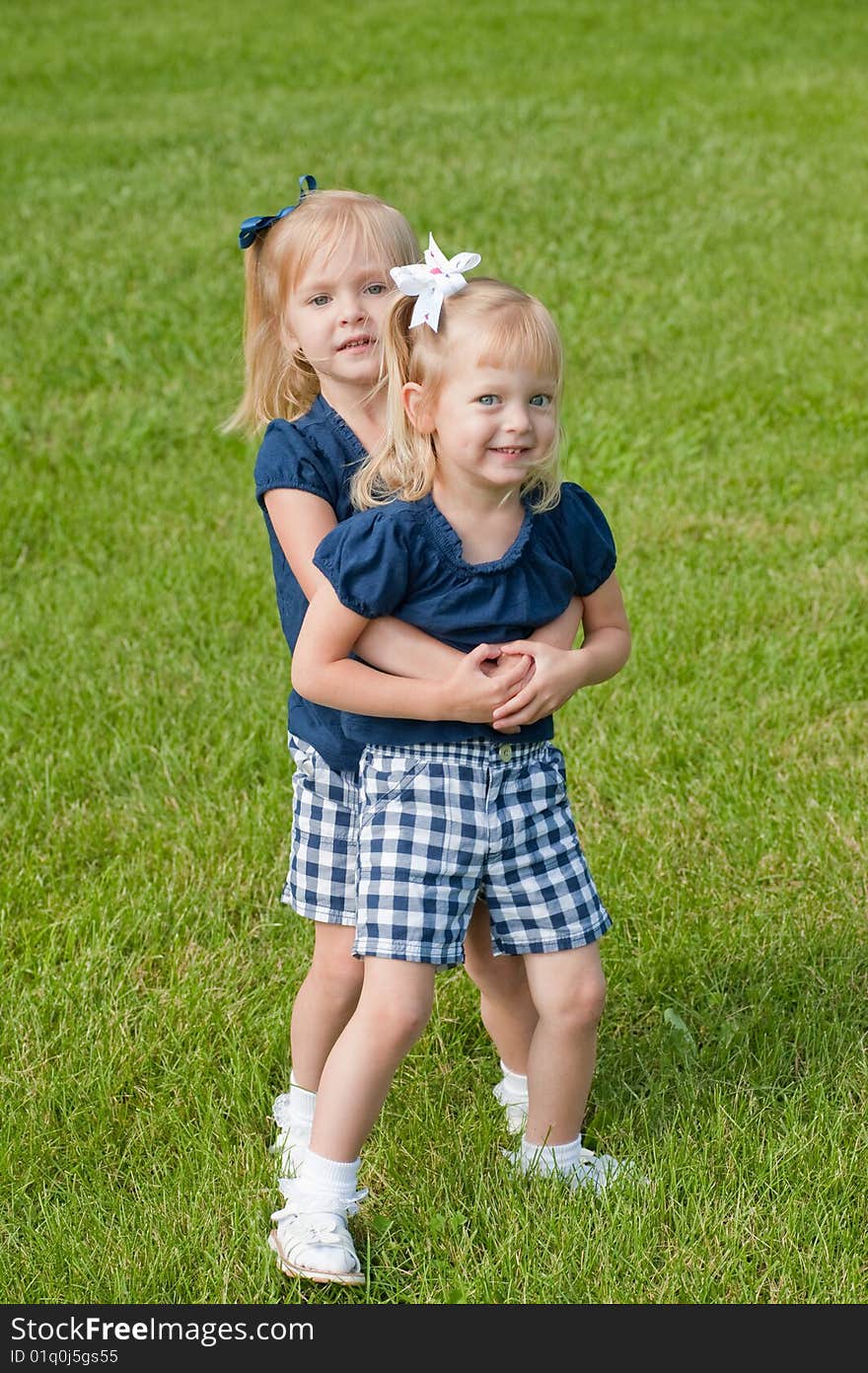 Two Little girls hugging