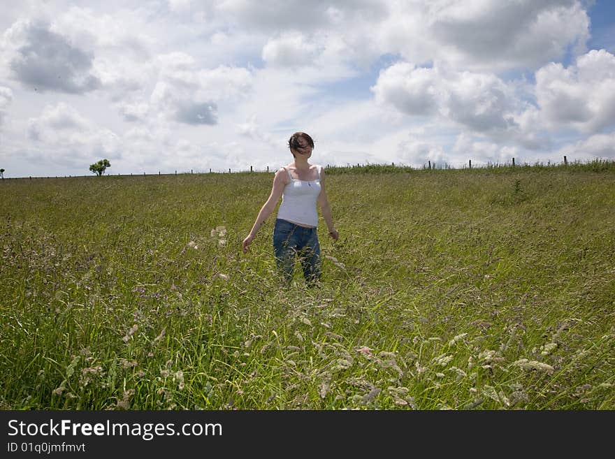 Wonman in the middle of a field