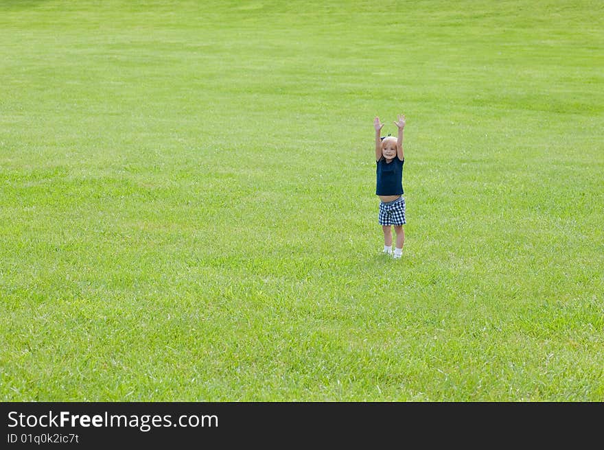 One Girl Standing In Grass