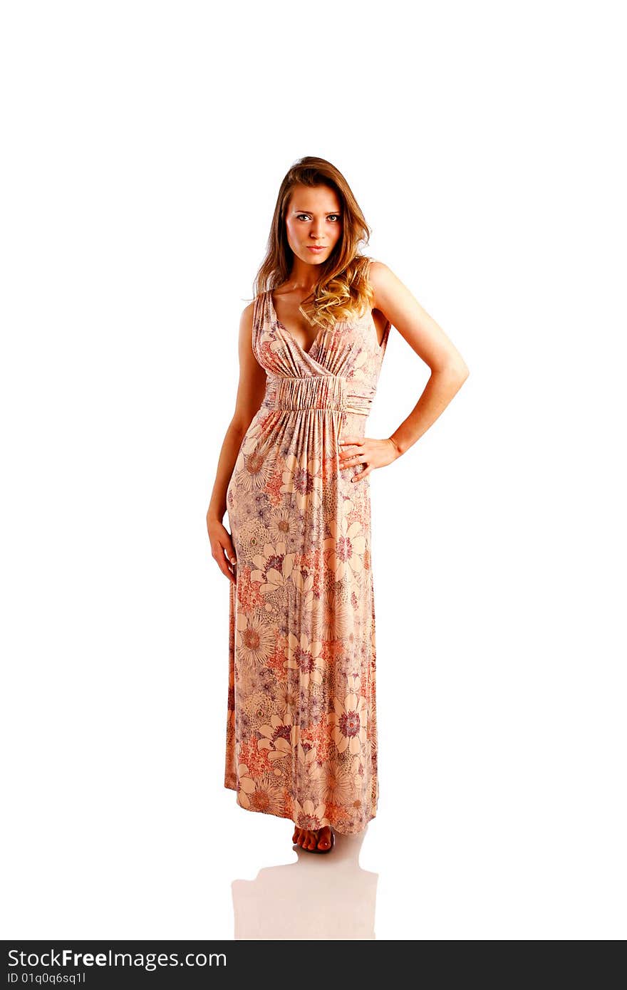 Model poses wearing sundress set against white backdrop with copy space.