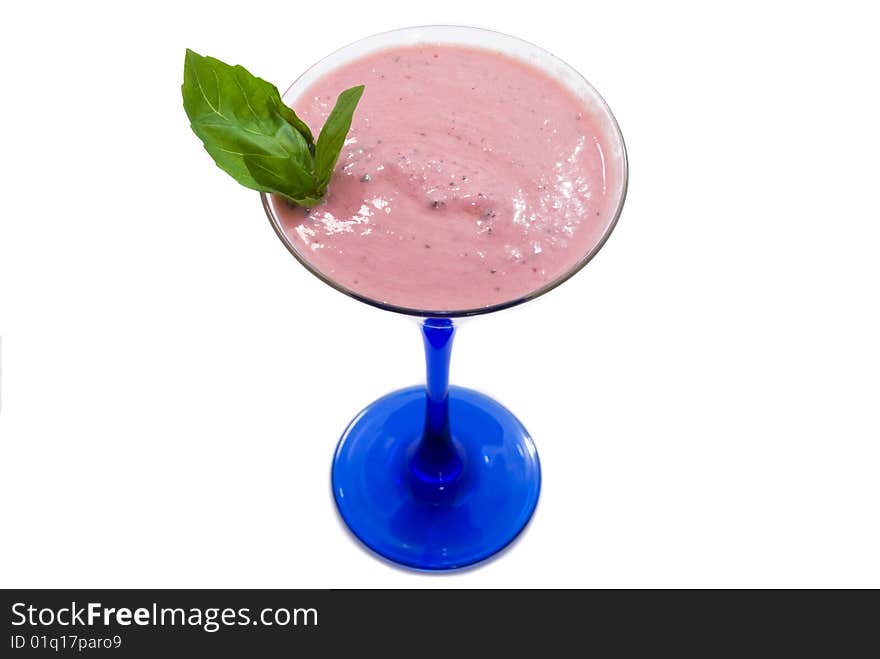 Strawberry milkshake with mint in the glass