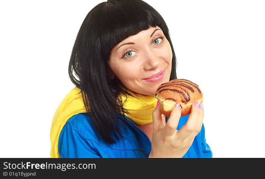 Girl eating a roll with chocolate