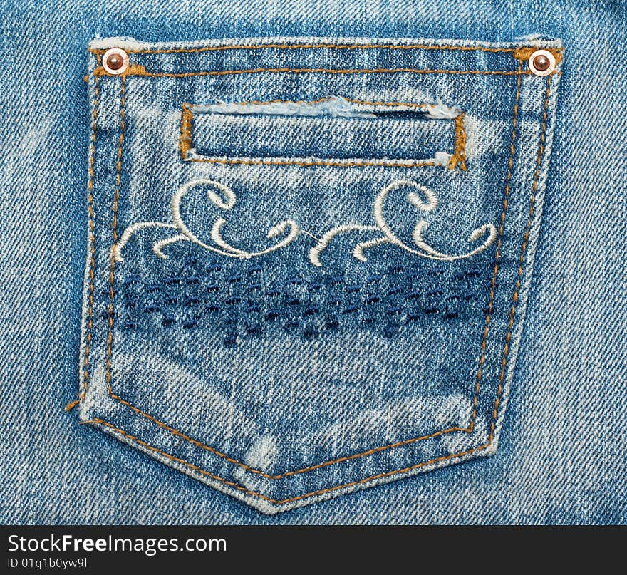 Jeans pocket, embroider pattern on fabrics, rivets and sewing seams