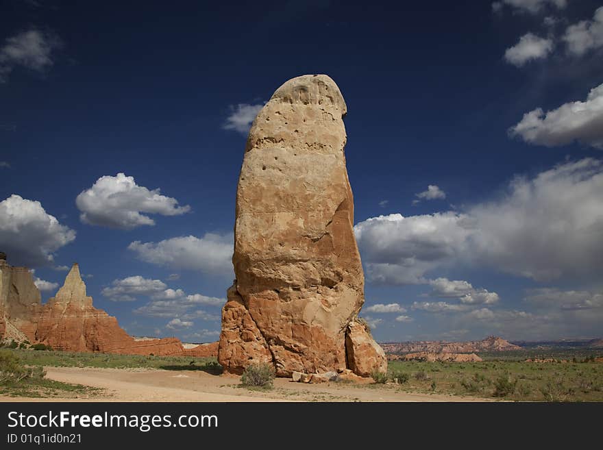 View of the red rock formations in Kodachrome Basin with blue skys and clouds