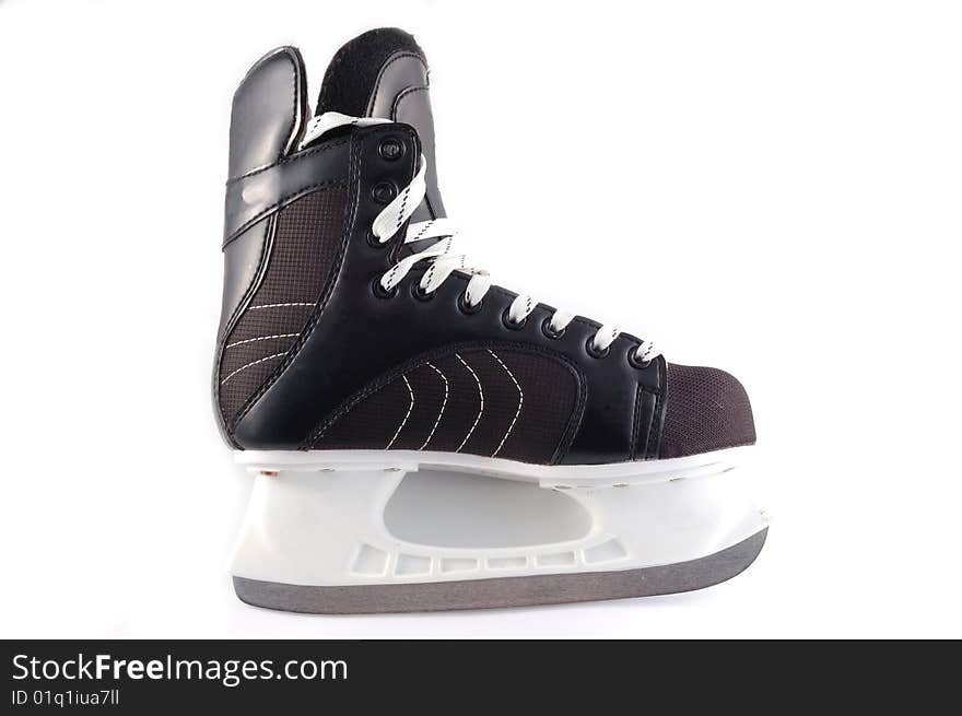 Black hockeys skates on a white background