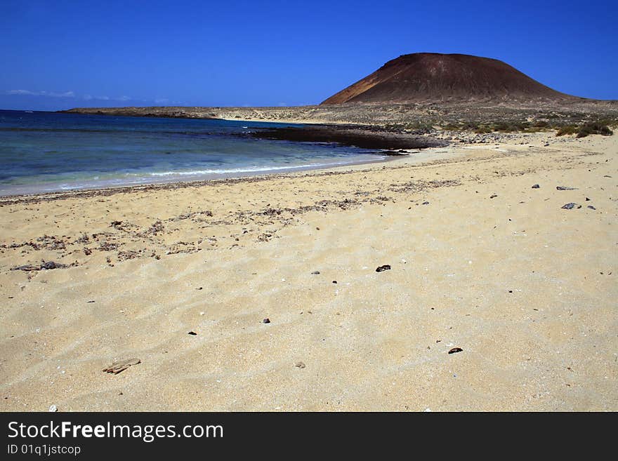 Beach and Montaña Amarilla on Graciosa island, Canary islands, Spain. Beach and Montaña Amarilla on Graciosa island, Canary islands, Spain