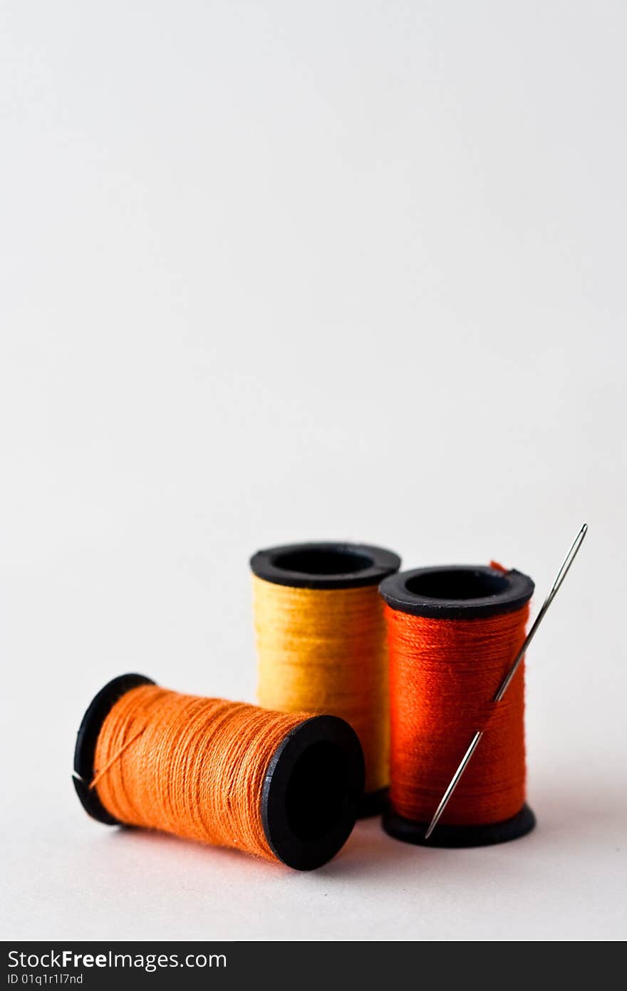 Red, orange, and yellow thread