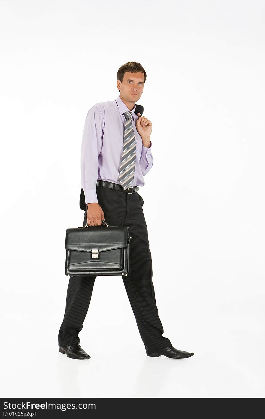 Young man in business suit on isolated background