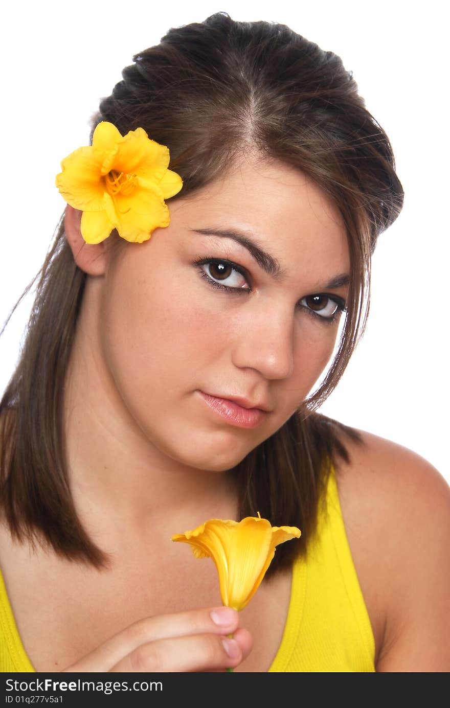 A pretty girl with yellow flowers and yellow top. A pretty girl with yellow flowers and yellow top.