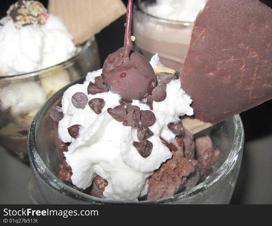 Chocolate Ice-cream (with cherry in focus)