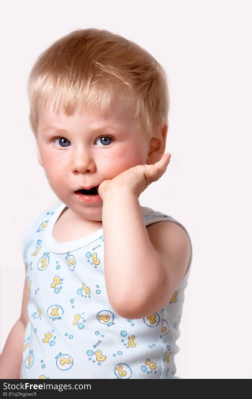 Portrait of the blond little boy on a background. Portrait of the blond little boy on a background