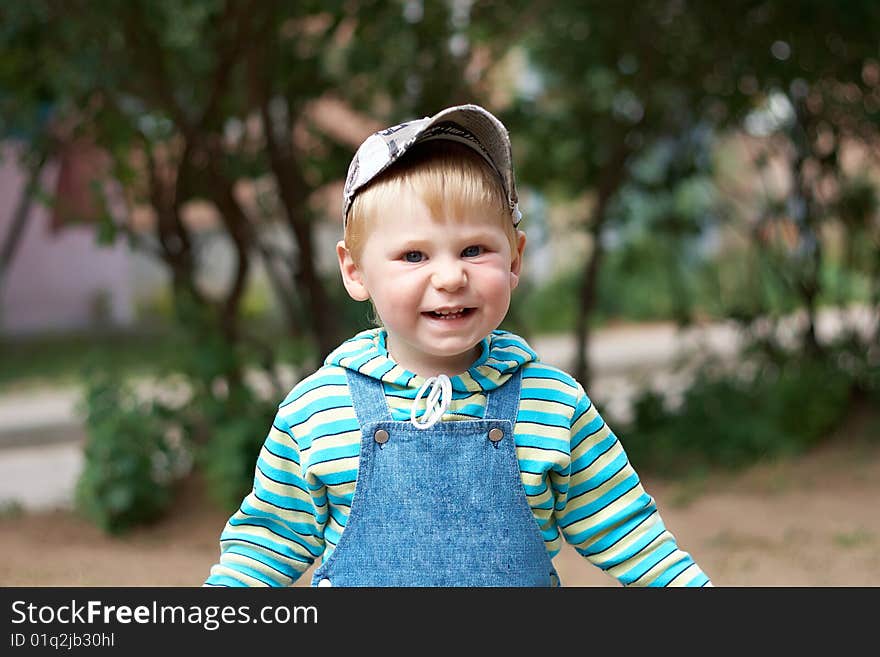 The boy on walk in the spring. The boy on walk in the spring