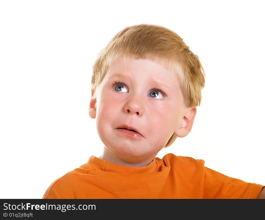 Portrait of the crying boy on a white background. Portrait of the crying boy on a white background