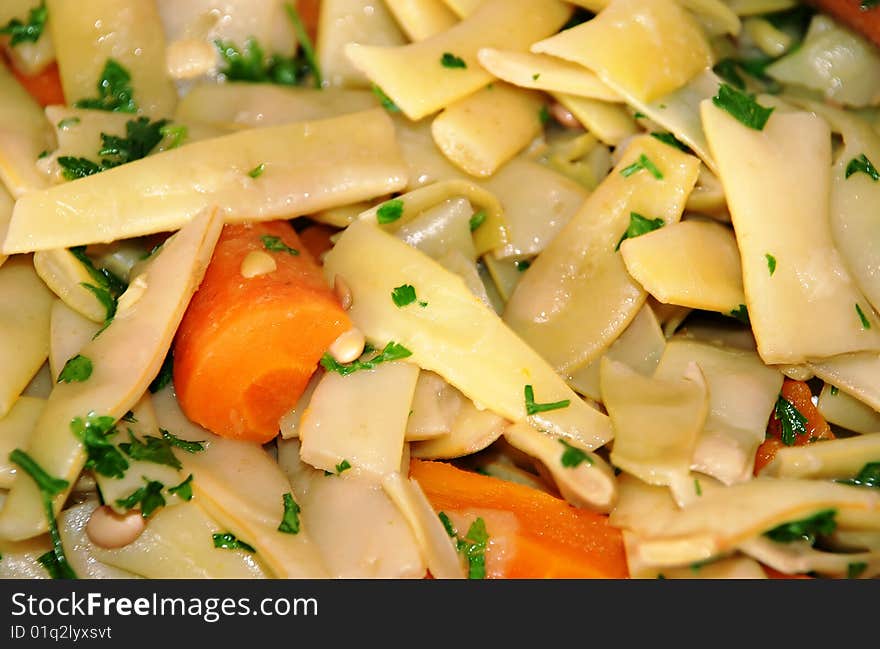 Stewed yellow bean and orange carrot background. Stewed yellow bean and orange carrot background