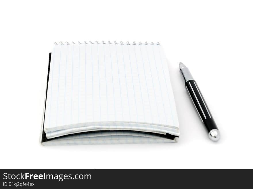 Pen and blank notepad