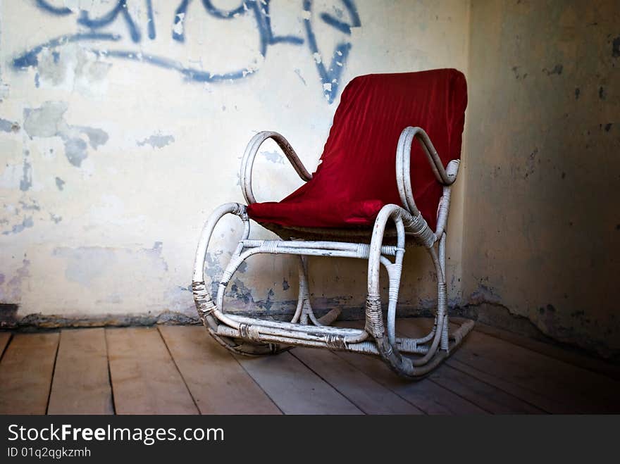 Old armchair in the old building