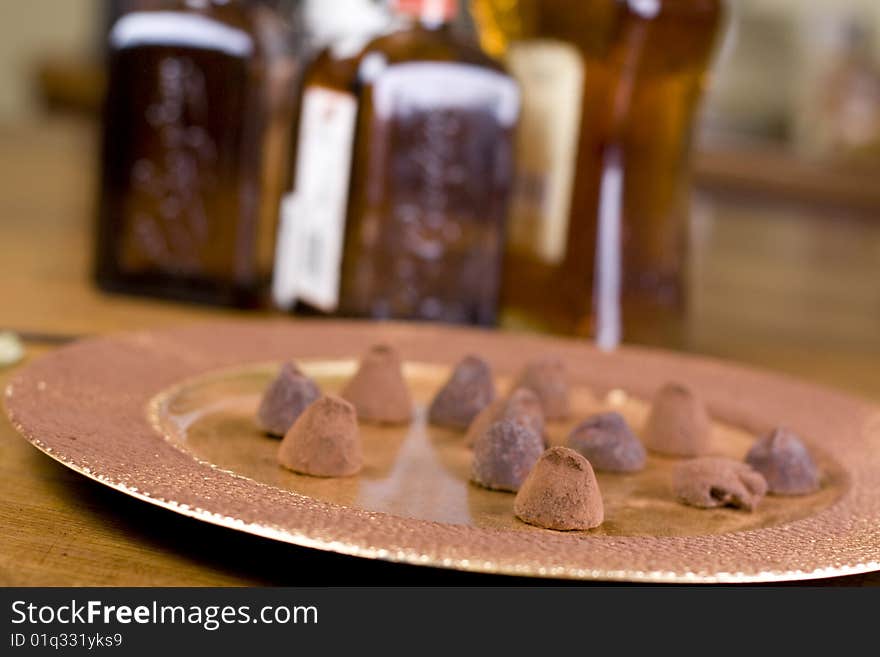 Pralines served on gold plate