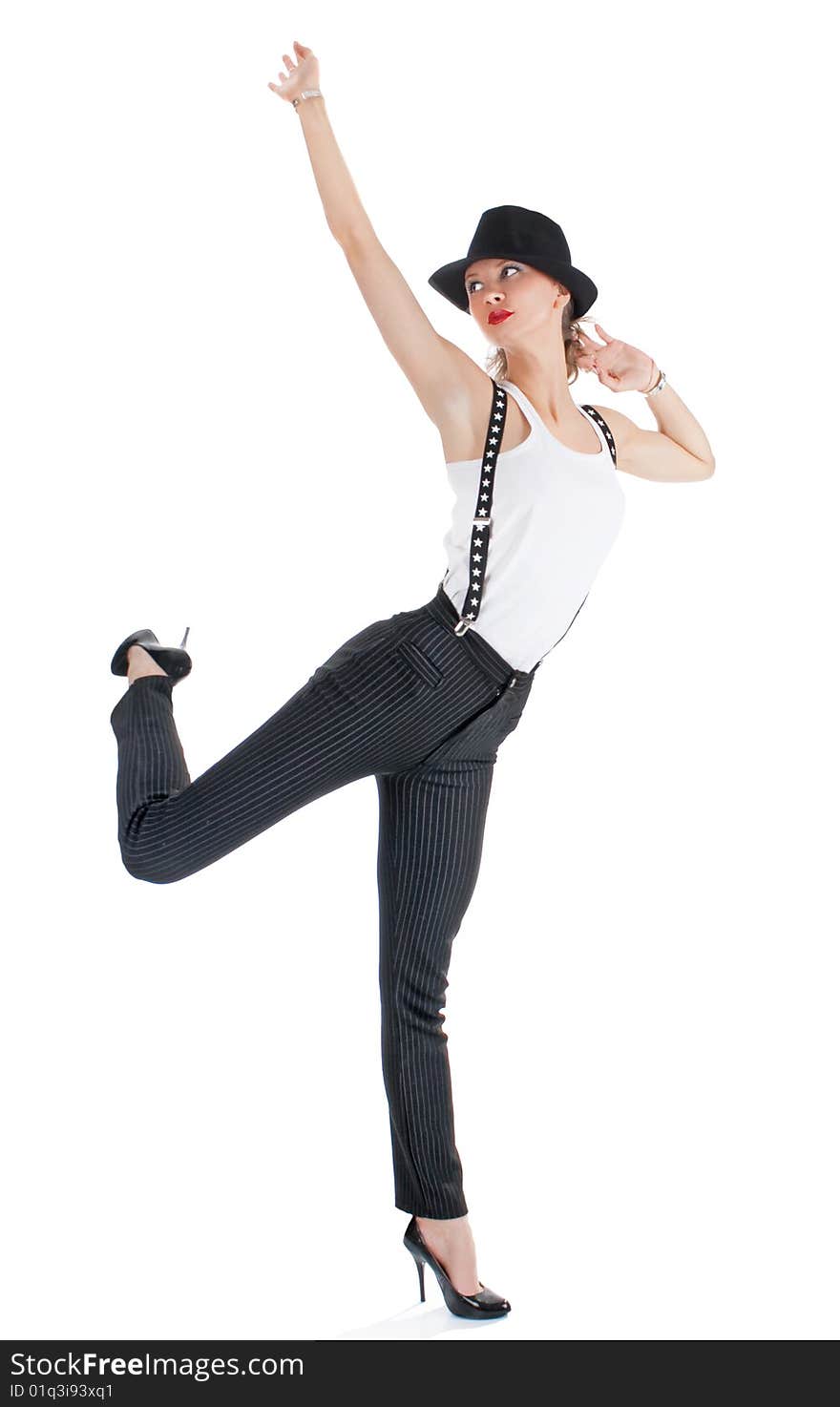 Photo-session in studio of the young blondy girl with black hat