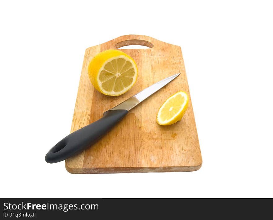 Lemon and knife isolated on white background