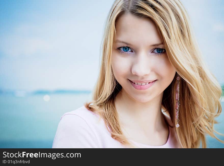 Girl with blue eyes outdoor. Girl with blue eyes outdoor