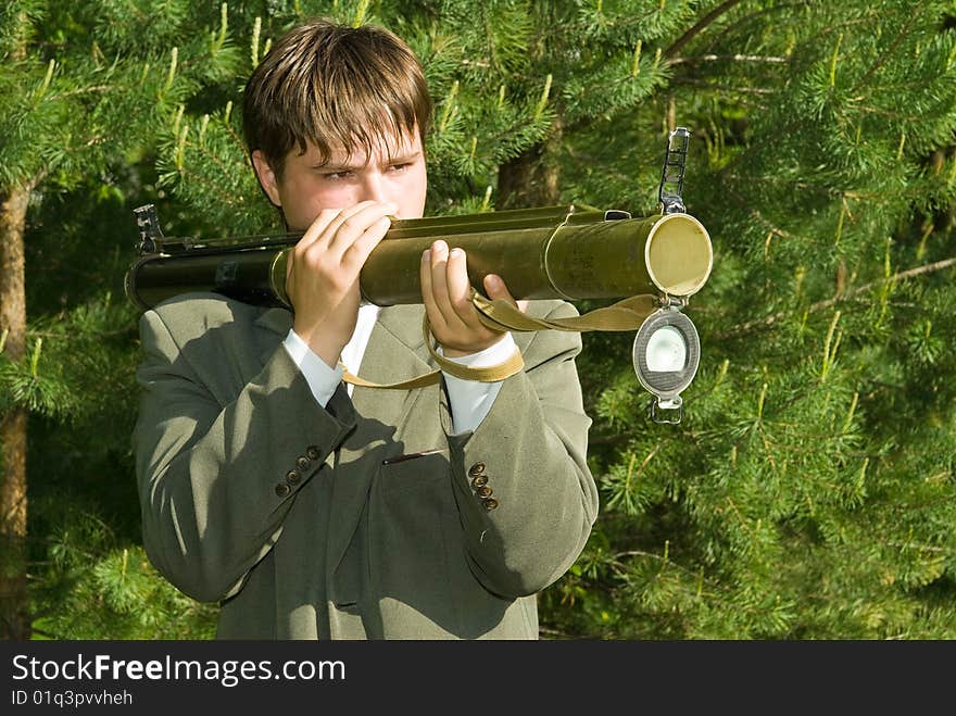 Manager shoots from a grenade launcher