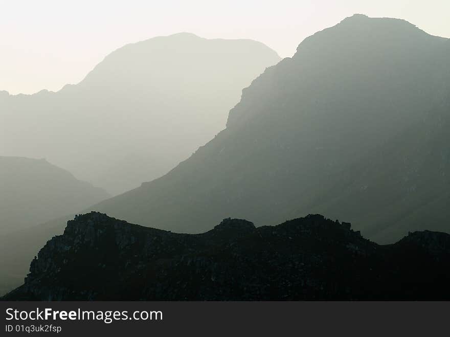 Silhouette of misty mountain range. Silhouette of misty mountain range