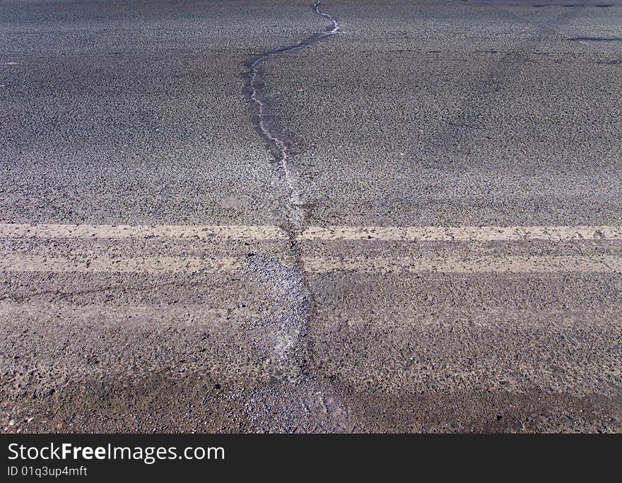 Double continuous line of road sectoring of a country highway. Double continuous line of road sectoring of a country highway