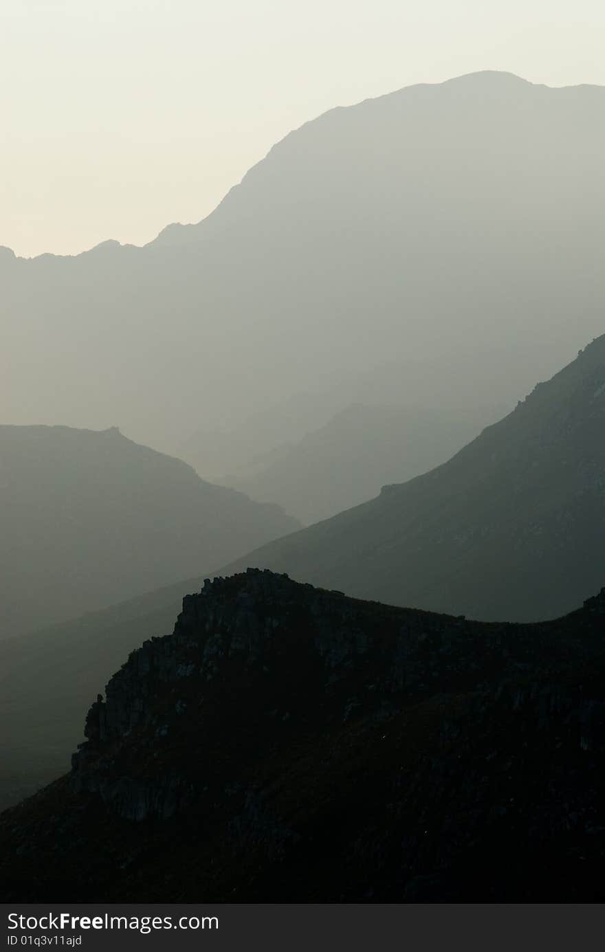 Silhouette of misty mountain range. Silhouette of misty mountain range