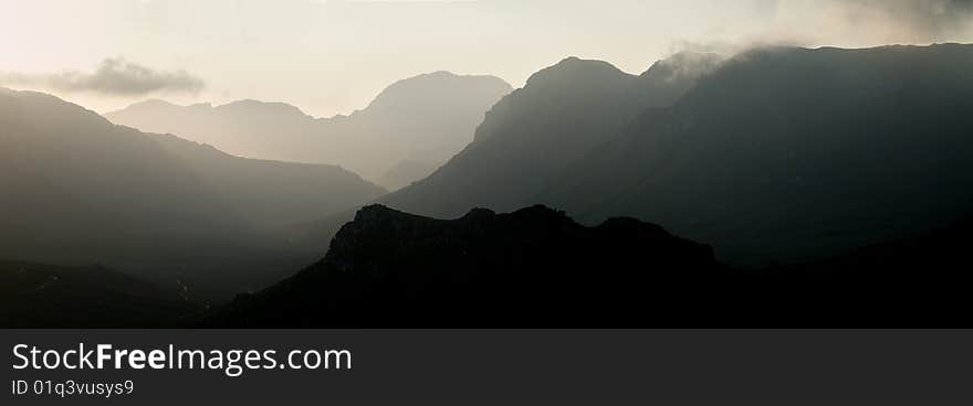 Silhouette of misty mountain range. Silhouette of misty mountain range