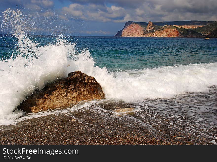 A big sea wave on the coastline. A big sea wave on the coastline