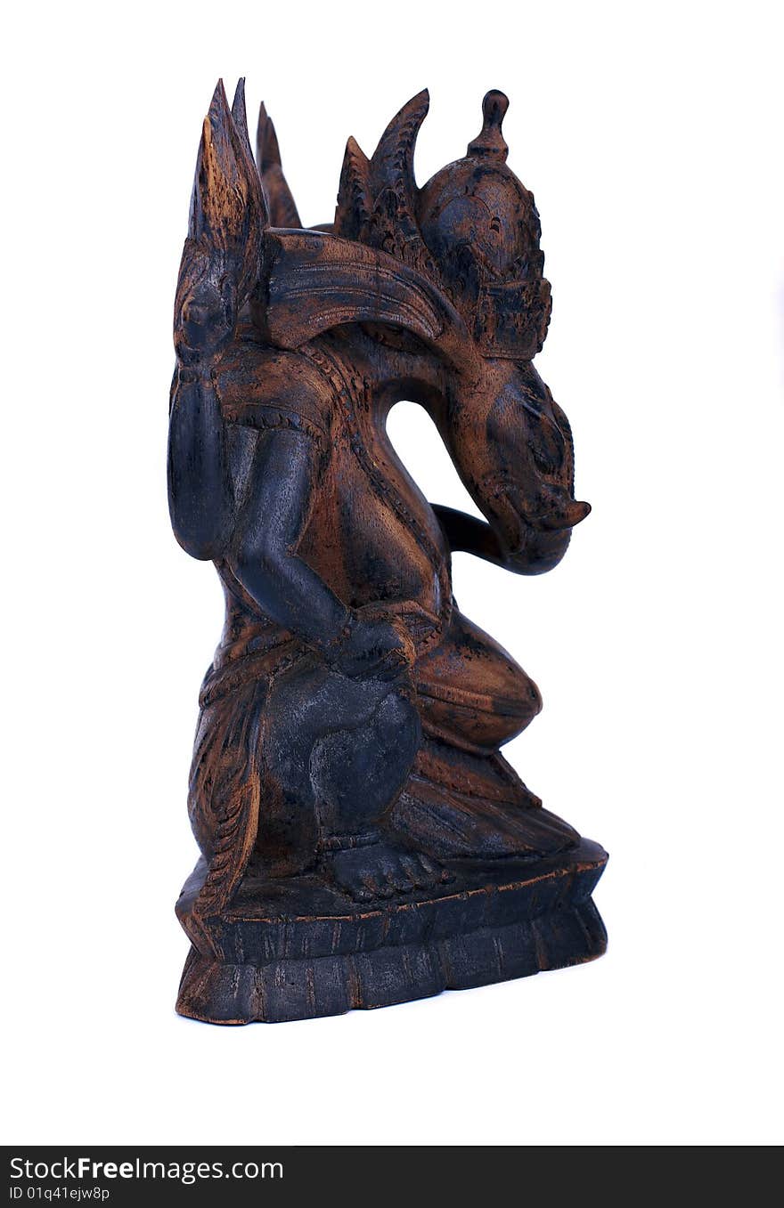 Wooden statuette of hindu god ganesh side view