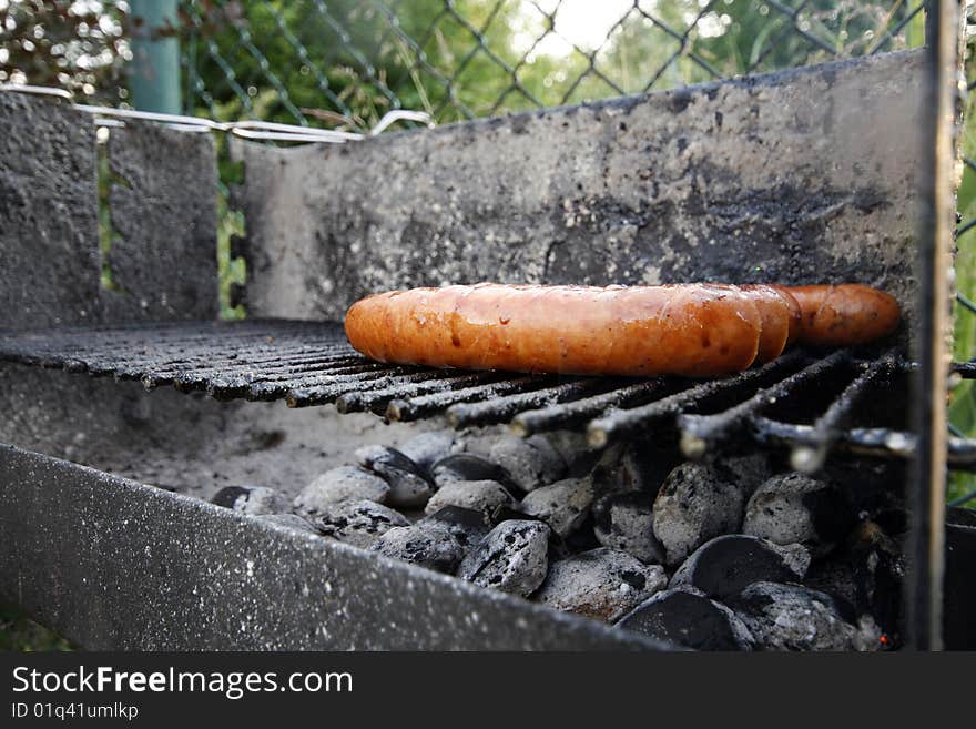 Tasty grilled saussages close-up