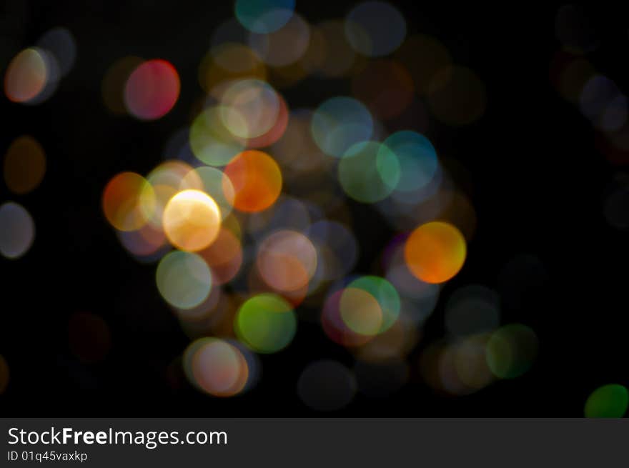 Glowing blured lights background black. Glowing blured lights background black