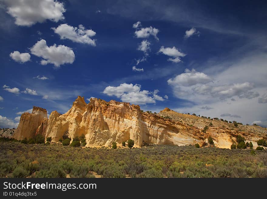 View of the red rock formations in  Grand Staircase Escalante National Monument with blue sky�s and clouds