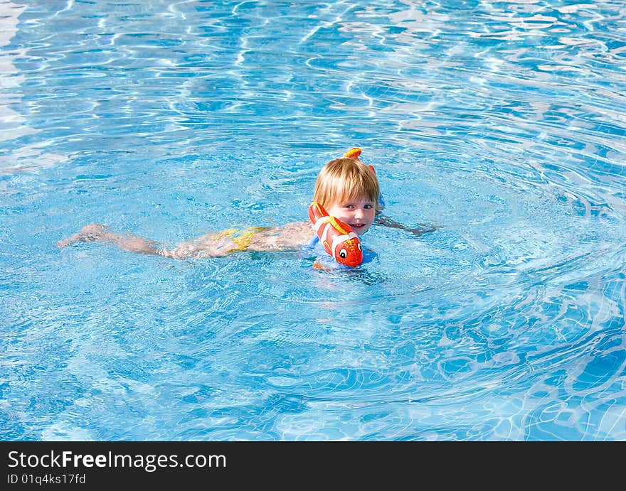 Little girl in the swimming pool. Little girl in the swimming pool