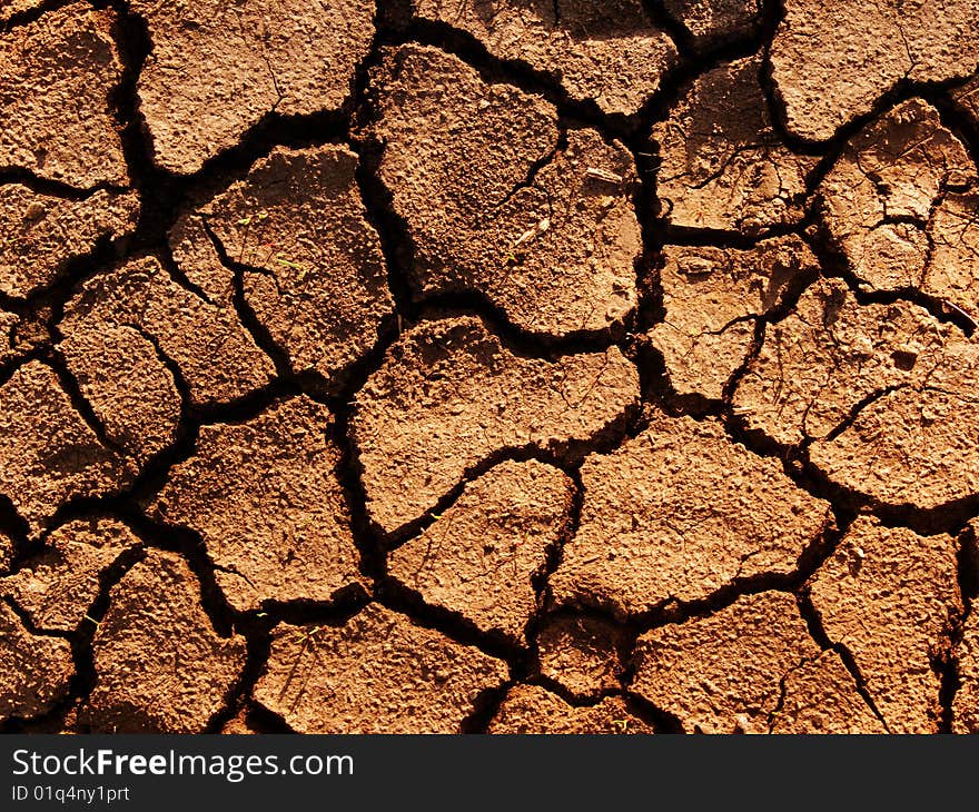 Cracks in a ground аbstract background