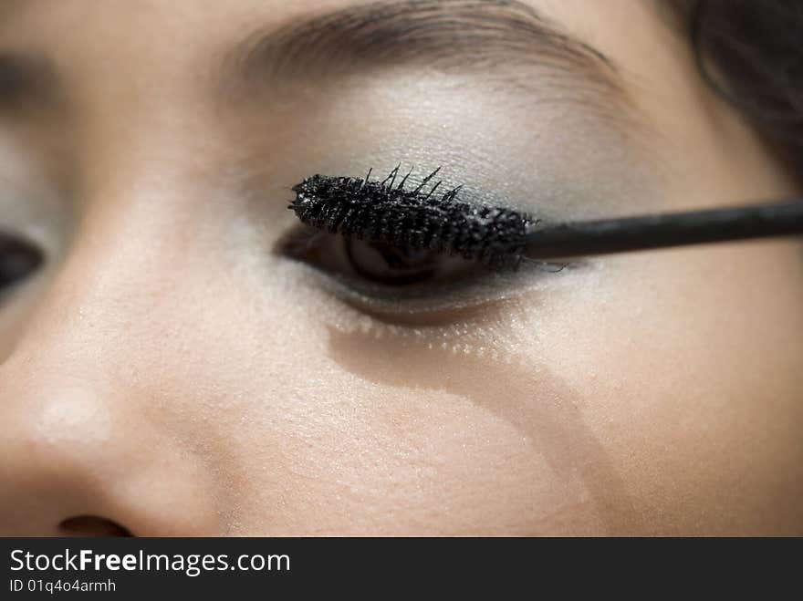 A young woman getting her eye lashes made up. ADOBE RGB (1998) color profile, image is punchier than the preview. A young woman getting her eye lashes made up. ADOBE RGB (1998) color profile, image is punchier than the preview.