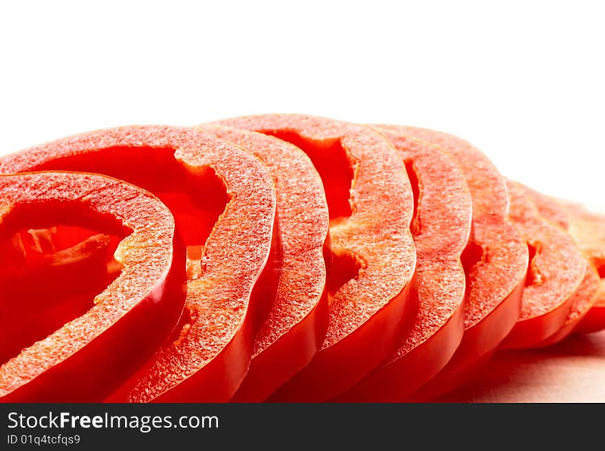 Sliced red pepper on cutting board. Sliced red pepper on cutting board