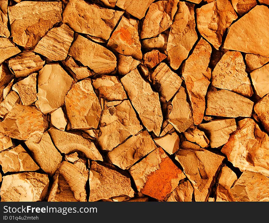 Wall of the house from a stone аbstract background