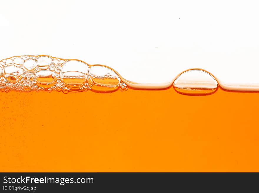 Macro of orange soap bubbles isolated. Macro of orange soap bubbles isolated